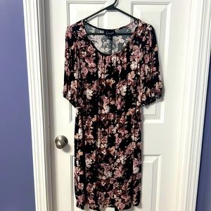 Size 8 Black with pink flower design dress with pockets!